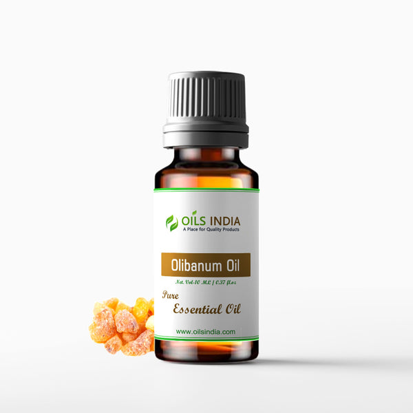 A bottle of Olibanum Oil with a label that reads 'Olibanum Oil - Pure Essential Oil'. The bottle is sealed with a black cap and is displayed against a white background with a small amount of frankincense resin in the foreground.
