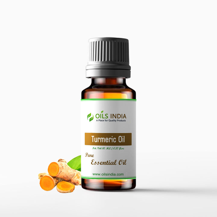 Bottle of Oils India Turmeric Oil with turmeric roots on a white background