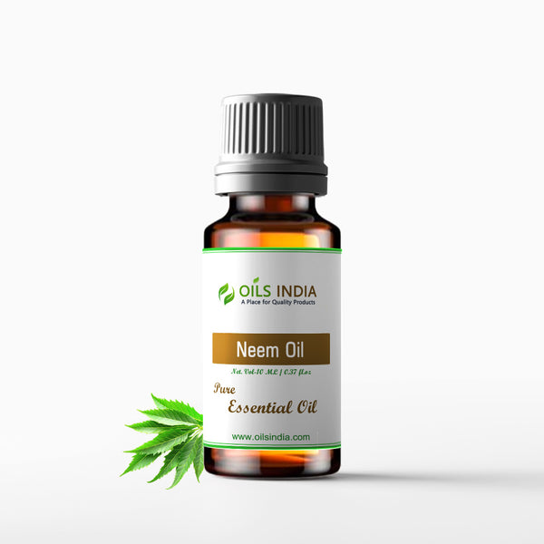 A bottle of Neem Oil with a label that reads 'Neem Oil - Pure Essential Oil' from Oils India. The bottle is accompanied by a small leaf, possibly a neem leaf, on the bottom right.