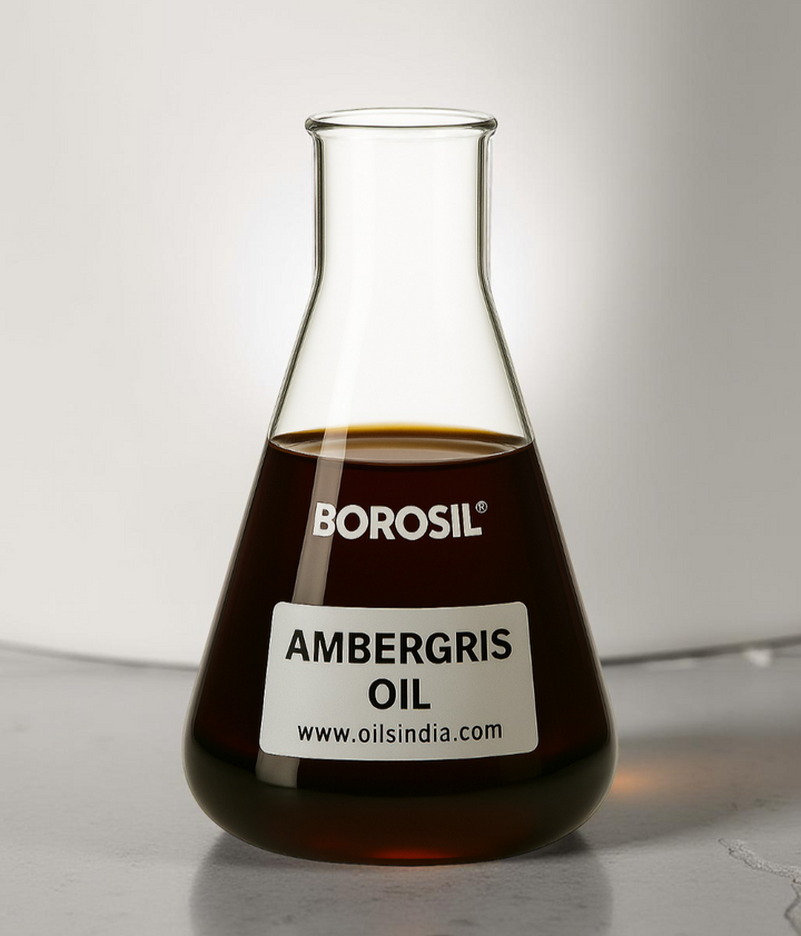 flask filled with ambergris oil on a light background by Oils India